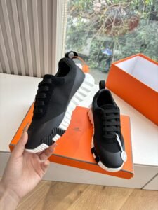 Hermès Bouncing sneakers zwart met witte zool