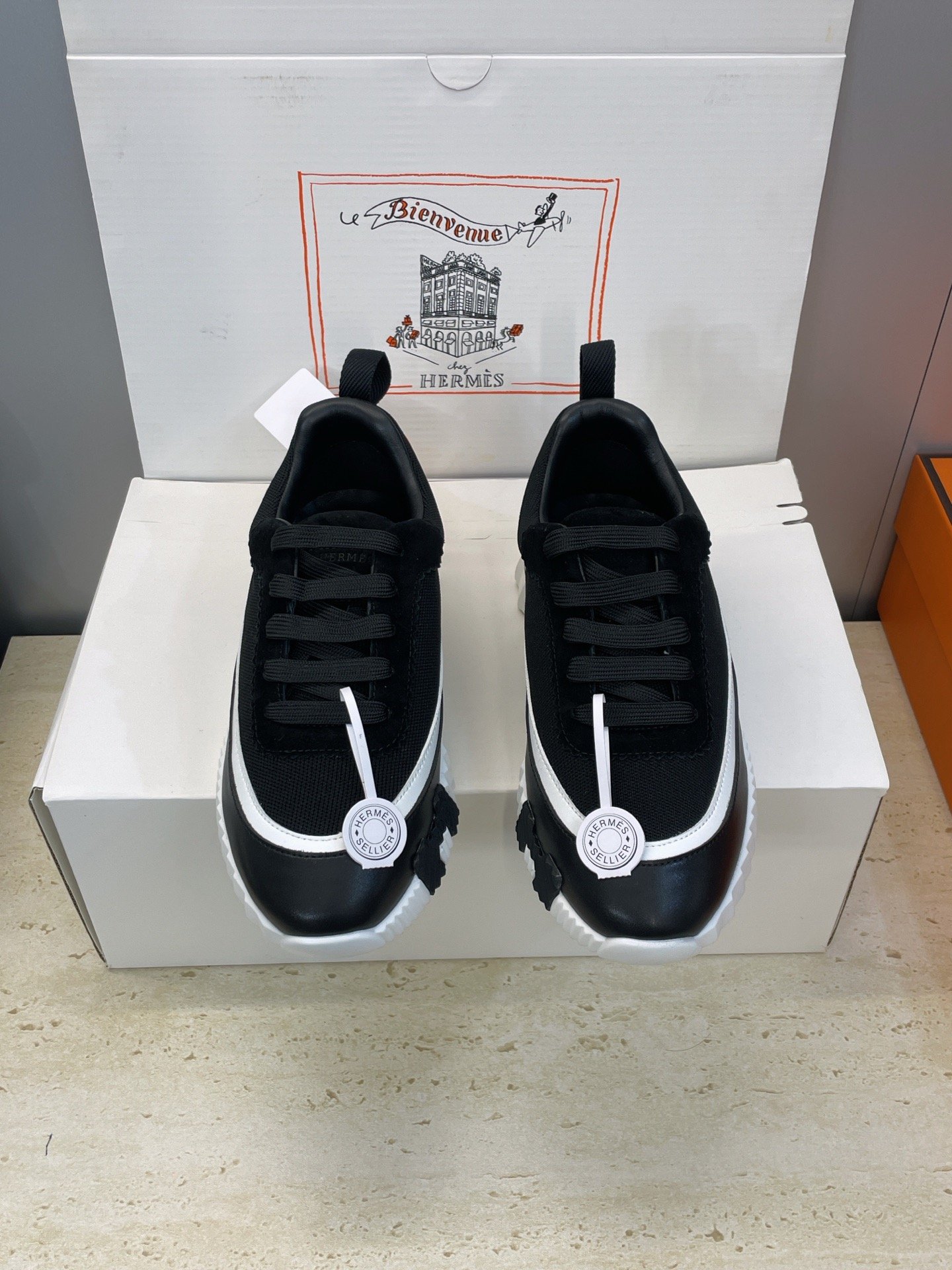 hermès bouncing sneakers l zwart en wit