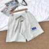 fear of god essentials nba zwart zomer set
